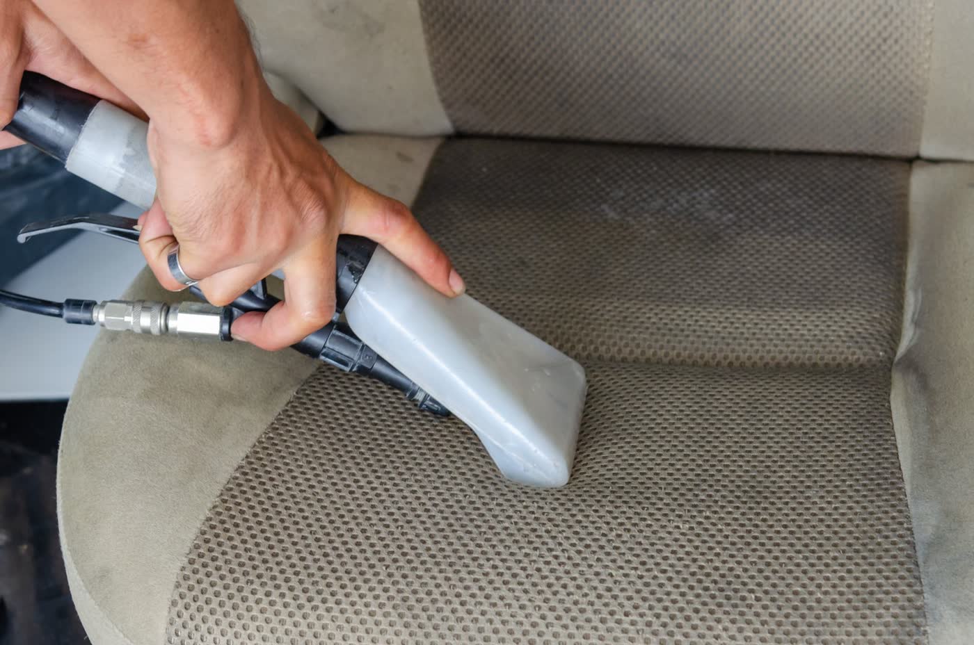 Deep extraction cleaning of a fabric car seat